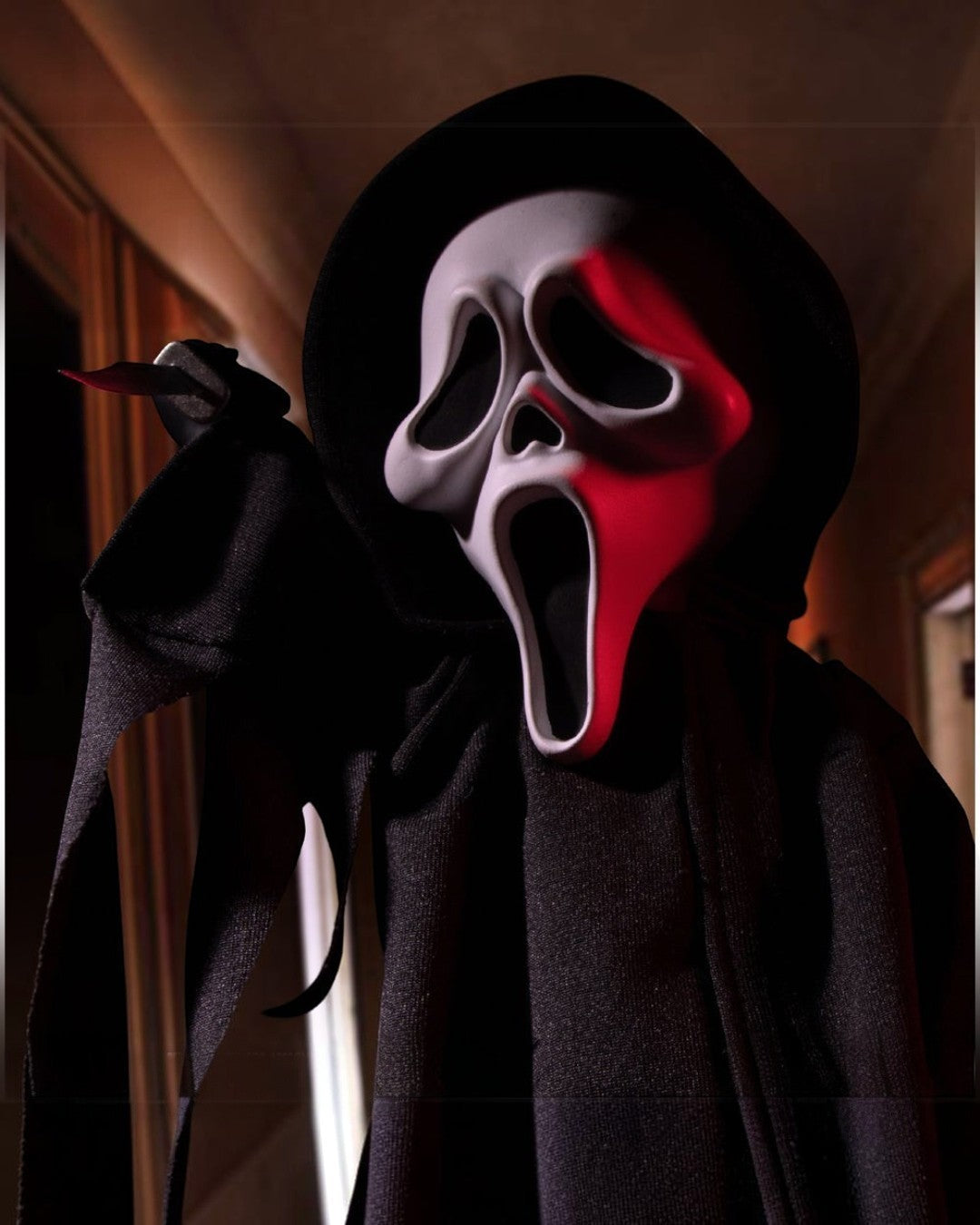 VaultifyUK Mezco Living Dead Dolls Scream Ghostface 10-inch figure with iconic mask, black hooded robe, and knife.