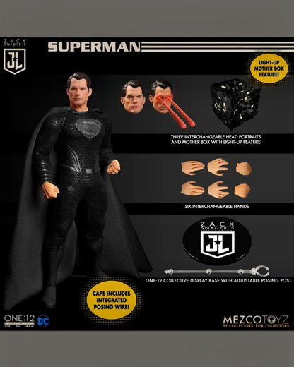 VaultifyUK Mezco One:12 Collective Superman figure with black suit, swappable heads, light-up Mother Box, and accessories