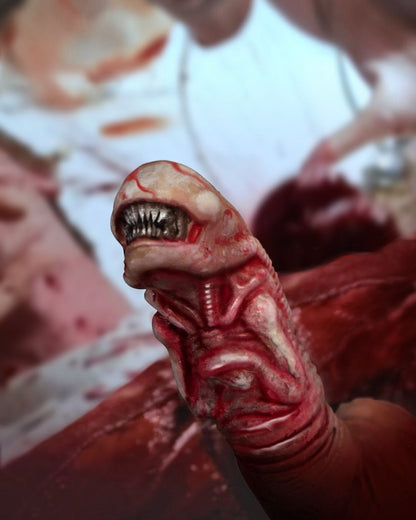 VaultifyUK Mezco One:12 Collective Xenomorph Chestburster action figure with realistic bloody detail and sharp teeth