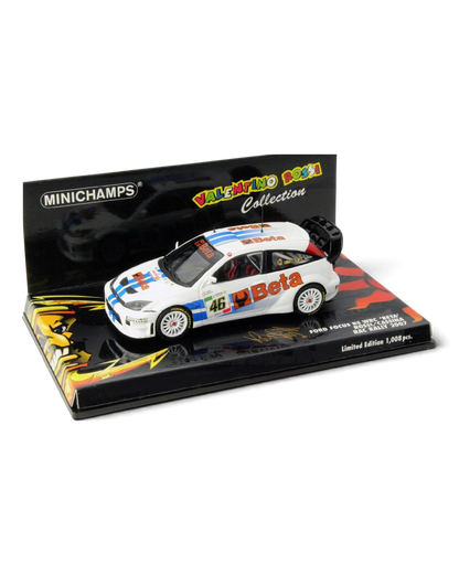 VaultifyUK Minichamps 1:43 scale Ford Focus RS WRC model car in white with blue stripes and Valentino Rossi #46 livery.
