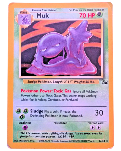 VaultifyUK Muk 13/62 Holo Rare Fossil Unlimited Pokémon card in moderately played condition