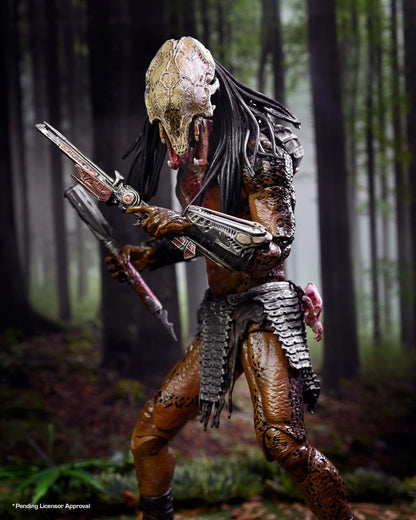 VaultifyUK NECA Prey Feral Predator 7-inch action figure with detailed bone mask, tribal armor, and weapon in a forest.