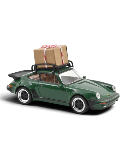VaultifyUK Norev 1:43 scale green 1978 Porsche 911 Turbo Christmas edition model car with a gift on the roof rack