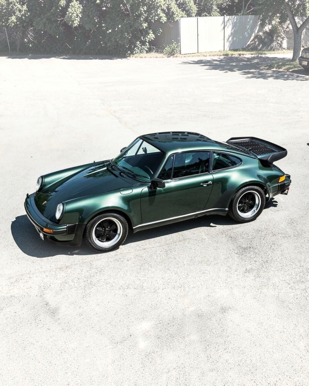 VaultifyUK Norev 1:43 scale 1978 Porsche 911 Turbo Christmas Edition diecast model car in metallic green