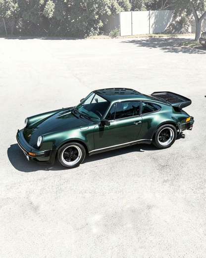 VaultifyUK Norev 1:43 scale 1978 Porsche 911 Turbo Christmas Edition diecast model car in metallic green