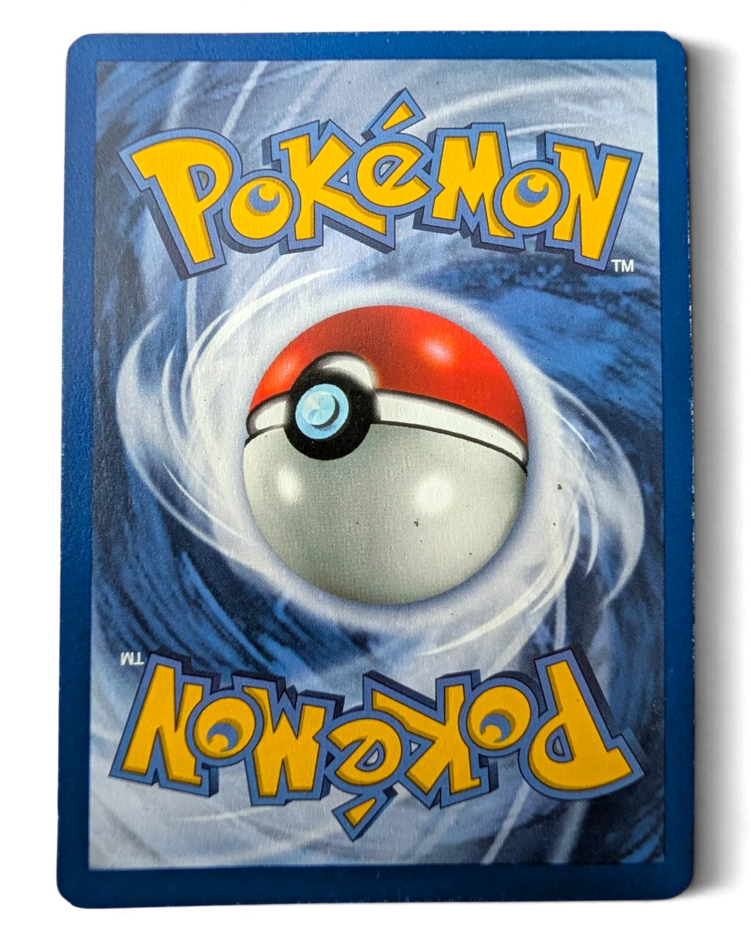 VaultifyUK Pokémon TCG Spearow Jungle set card back showing classic blue and white swirl design with moderate wear