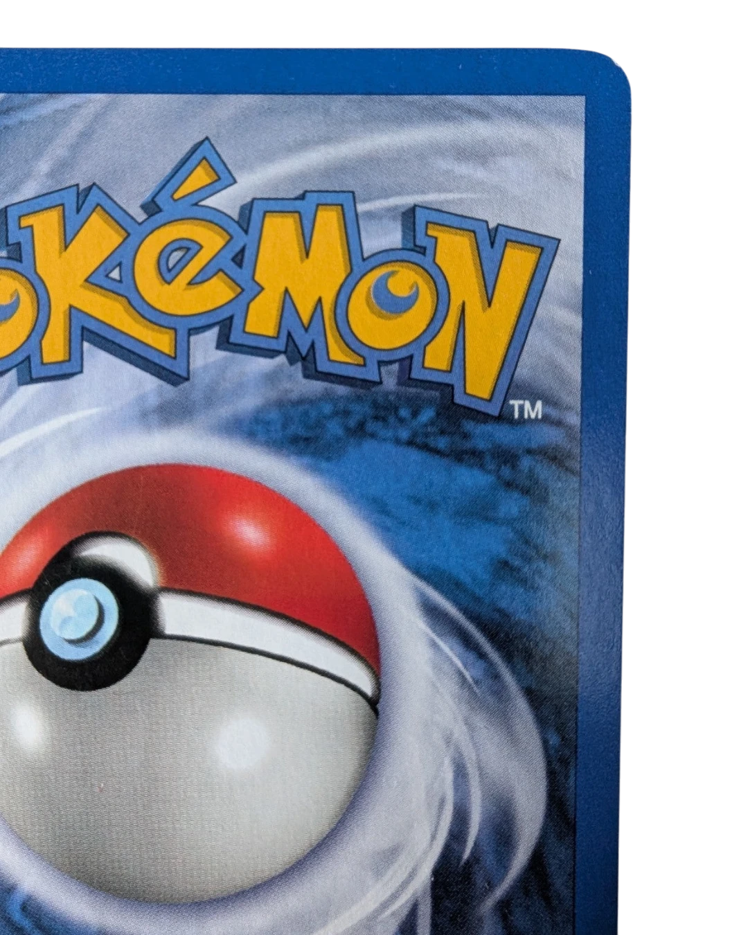 VaultifyUK vintage Pokémon TCG card back showing the classic blue swirl design and Poké Ball logo