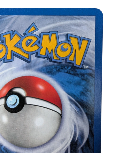 VaultifyUK vintage Pokémon TCG card back showing the classic blue swirl design and Poké Ball logo