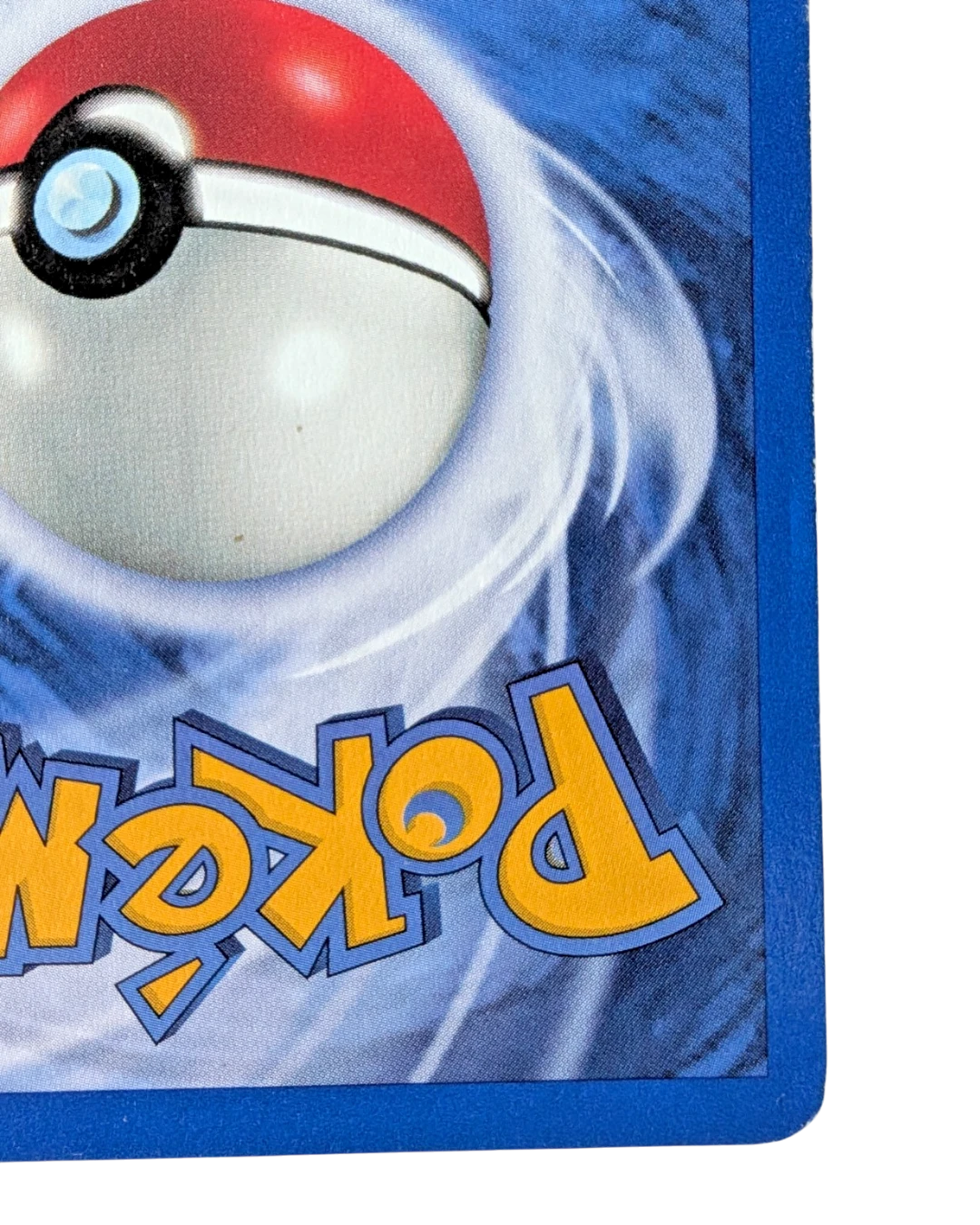 VaultifyUK vintage Pokémon TCG card back showing the classic blue swirl design and Poké Ball logo