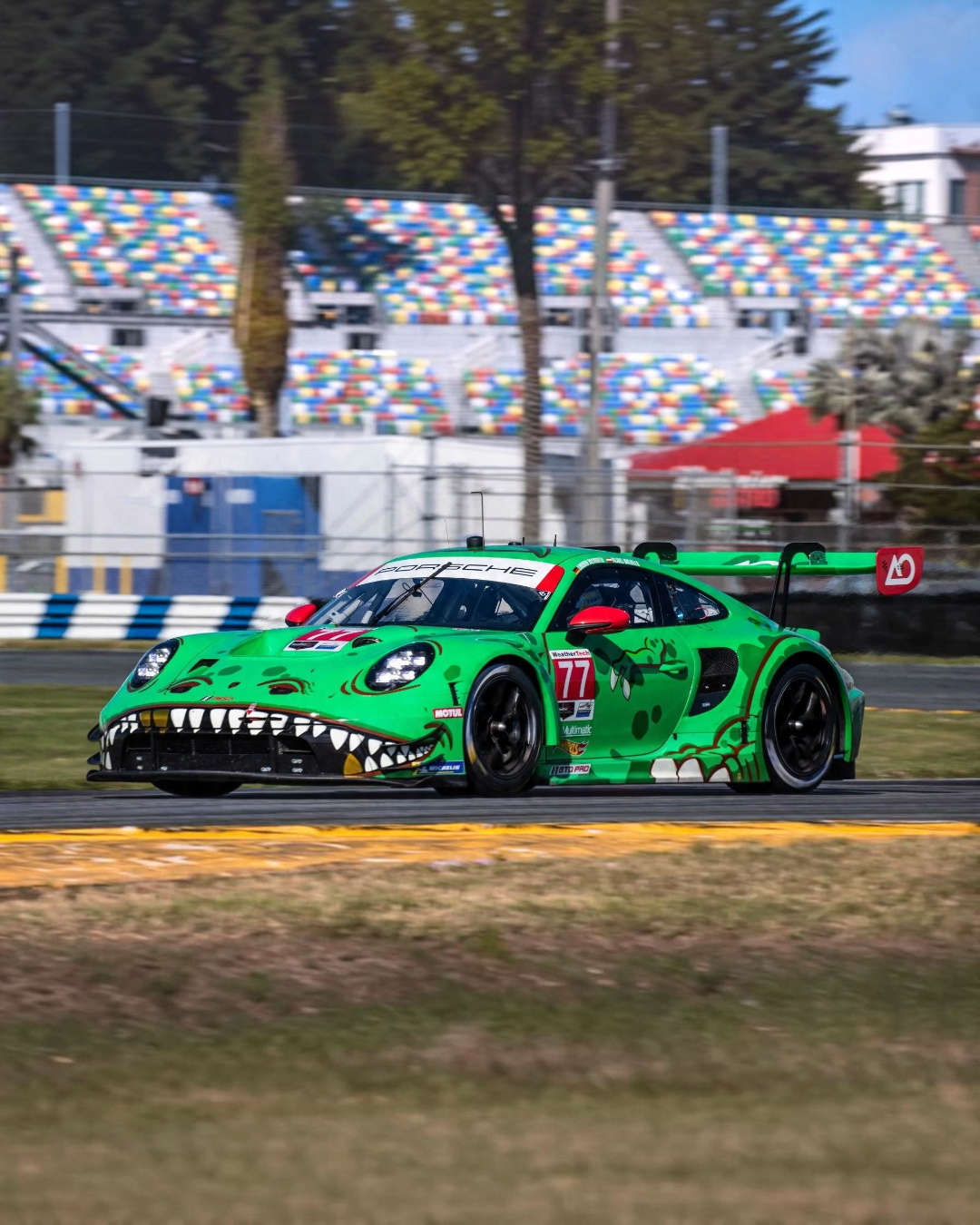 VaultifyUK MINI GT Porsche 911 GT3 R Rexy diecast model featuring the iconic green T-Rex livery from Daytona 24 Hours