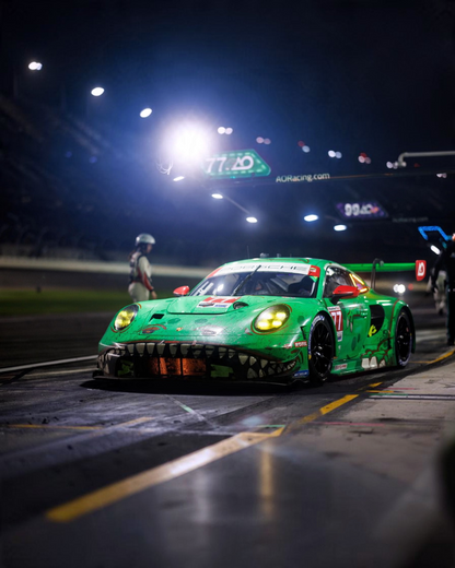 VaultifyUK MINI GT Porsche 911 GT3 R Rexy diecast car in green T-Rex livery at Daytona 24 Hours night race