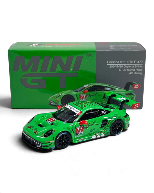 VaultifyUK MINI GT Porsche 911 GT3 R Rexy diecast model in green T-Rex livery from the 2024 Daytona 24 Hours race.