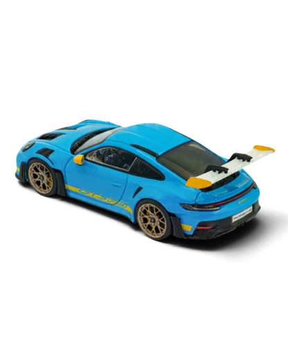 VaultifyUK Solido 1:43 scale Porsche 911 992 GT3 RS model car in Riviera Blue with yellow accents and rear wing