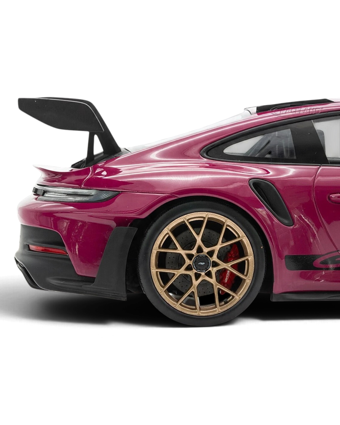 VaultifyUK Schuco 1:18 scale Porsche 911 GT3 RS model car in Rubystar magenta with gold wheels and rear wing