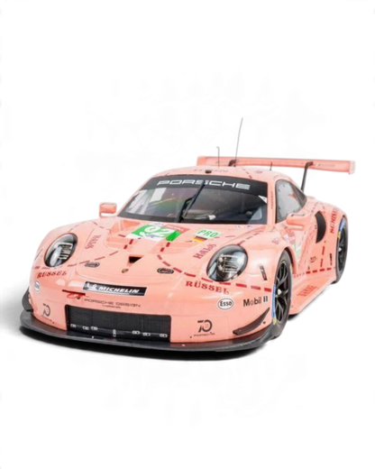 VaultifyUK 1:12 scale IXO Porsche 911 RSR Pink Pig model car featuring iconic 2018 Le Mans livery with butcher cuts