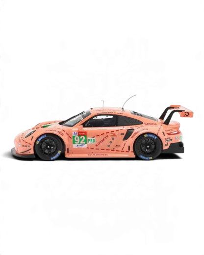 VaultifyUK 1:12 scale IXO Porsche 911 RSR Pink Pig model car, side view of the 2018 Le Mans LMGTE-Pro winning racer.