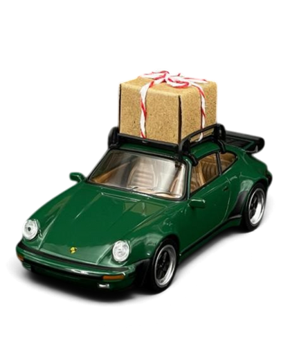 VaultifyUK 1:43 scale green 1978 Porsche 911 Turbo Christmas Edition model car with a gift box on the roof rack