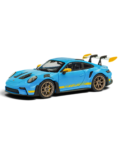 VaultifyUK 1:43 scale Solido Porsche 911 992 GT3 RS model in Riviera Blue with yellow accents and gold wheels