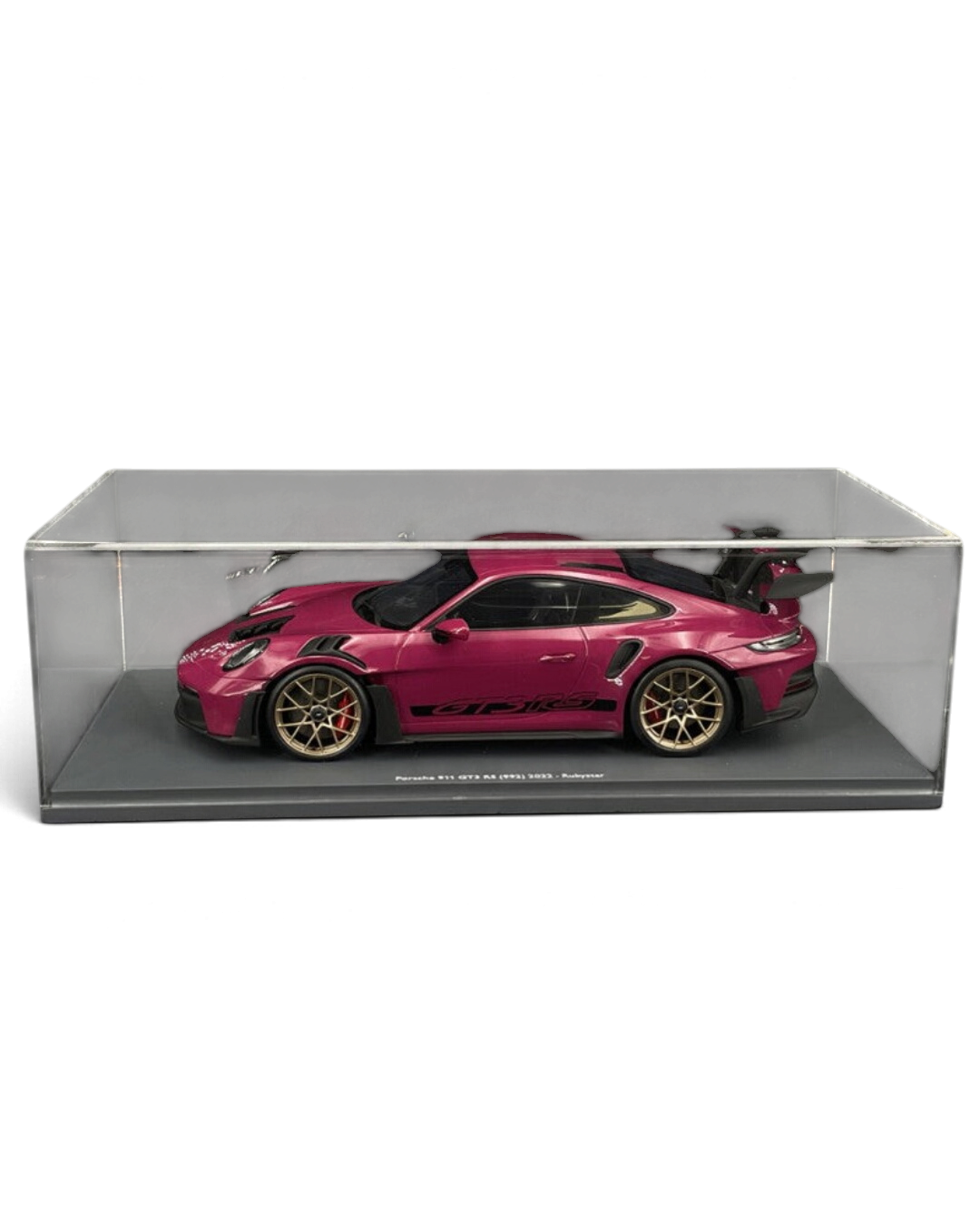 VaultifyUK Schuco 1:18 scale Porsche 911 992 GT3 RS model car in Rubystar magenta with gold wheels in display case