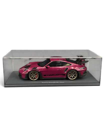 VaultifyUK Schuco 1:18 scale Porsche 911 992 GT3 RS model car in Rubystar magenta with gold wheels in display case