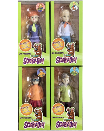 VaultifyUK Mezco Living Dead Dolls Scooby-Doo collector set featuring Daphne, Fred, Velma, and Shaggy in window boxes