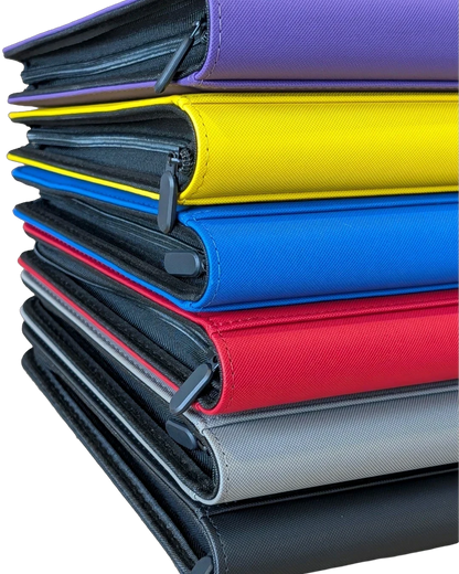 VaultifyUK Shield 9-pocket trading card binders stacked in purple, yellow, blue, red, grey, and black colors.