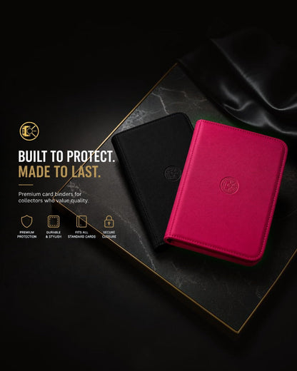 VaultifyUK Shield trading card binders in black and pink with a premium textured finish on a dark marble surface.