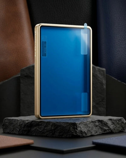 VaultifyUK Showcase gold aluminium PSA slab display case with protective film on a dark stone pedestal.