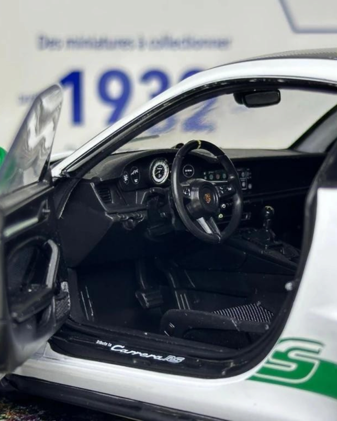VaultifyUK Solido 1:18 scale white Porsche 911 GT3 RS model car interior with open door and green accents