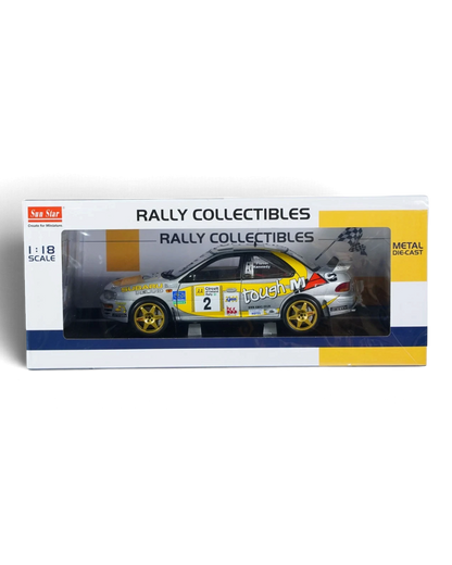 VaultifyUK 1:18 scale Sunstar Subaru Impreza 555 rally car in silver and yellow, Circuit of Ireland 1999 winner model.