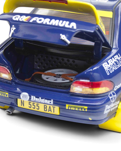 Sunstar 1:18 Subaru Impreza 555 #1 Dallavilla/Fappani with boot open showing the spare wheel