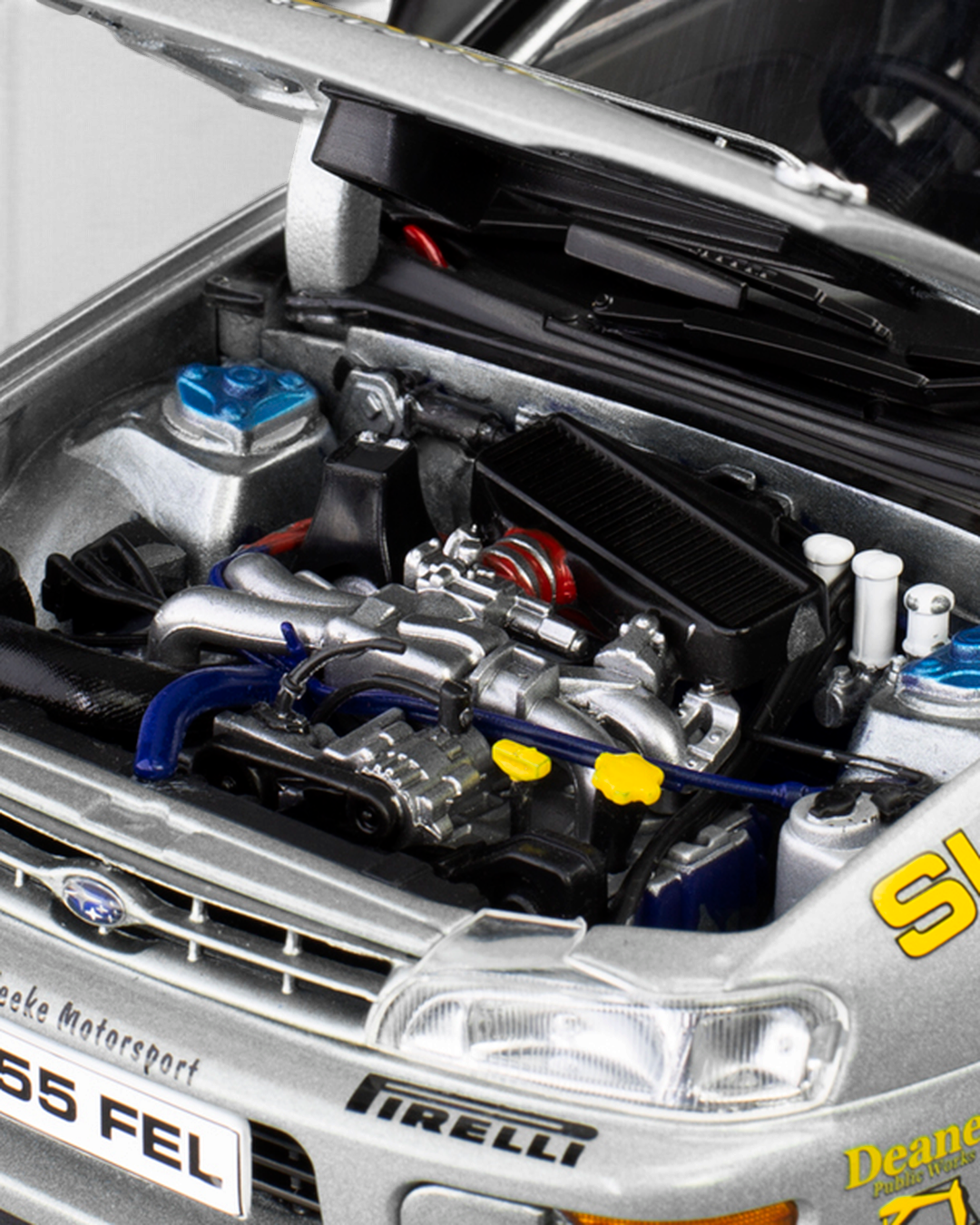 Sunstar 1:18 Subaru Impreza 555 #2 Fisher/Kennedy with bonnet open showing the engine bay