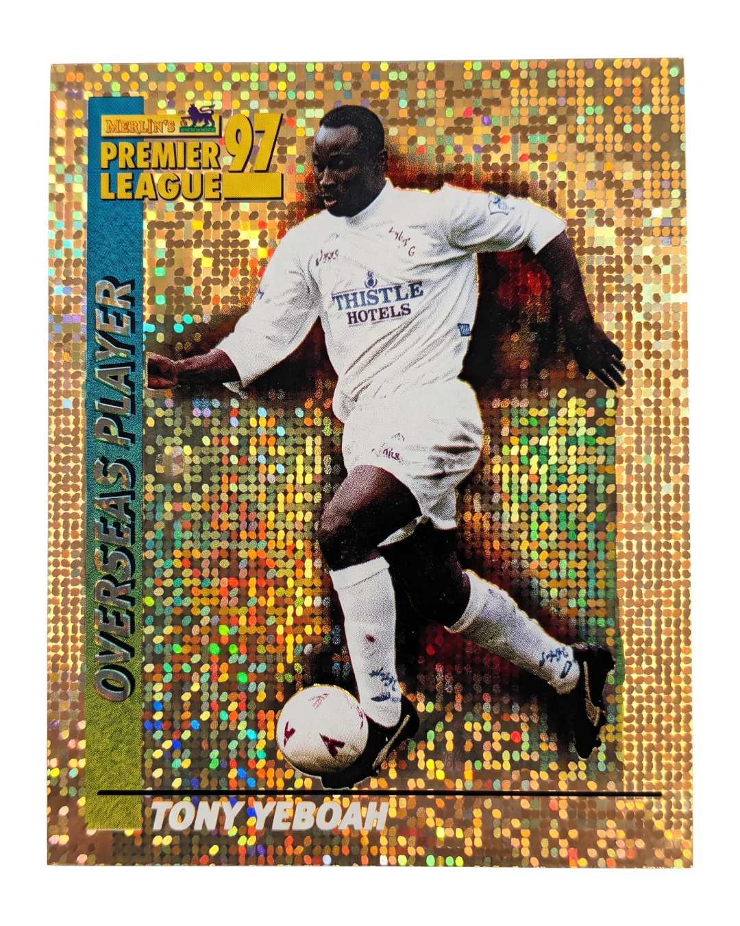 VaultifyUK 1997 Merlin Tony Yeboah Leeds United gold star-foil sticker featuring the striker in his team kit.
