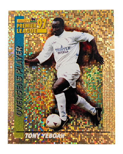 VaultifyUK 1997 Merlin Tony Yeboah Leeds United gold star-foil sticker featuring the striker in his team kit.