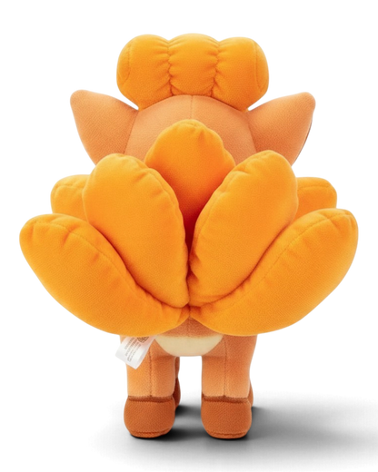 VaultifyUK 8-inch Vulpix plush toy showing the soft orange fur and detailed tail design from a back view