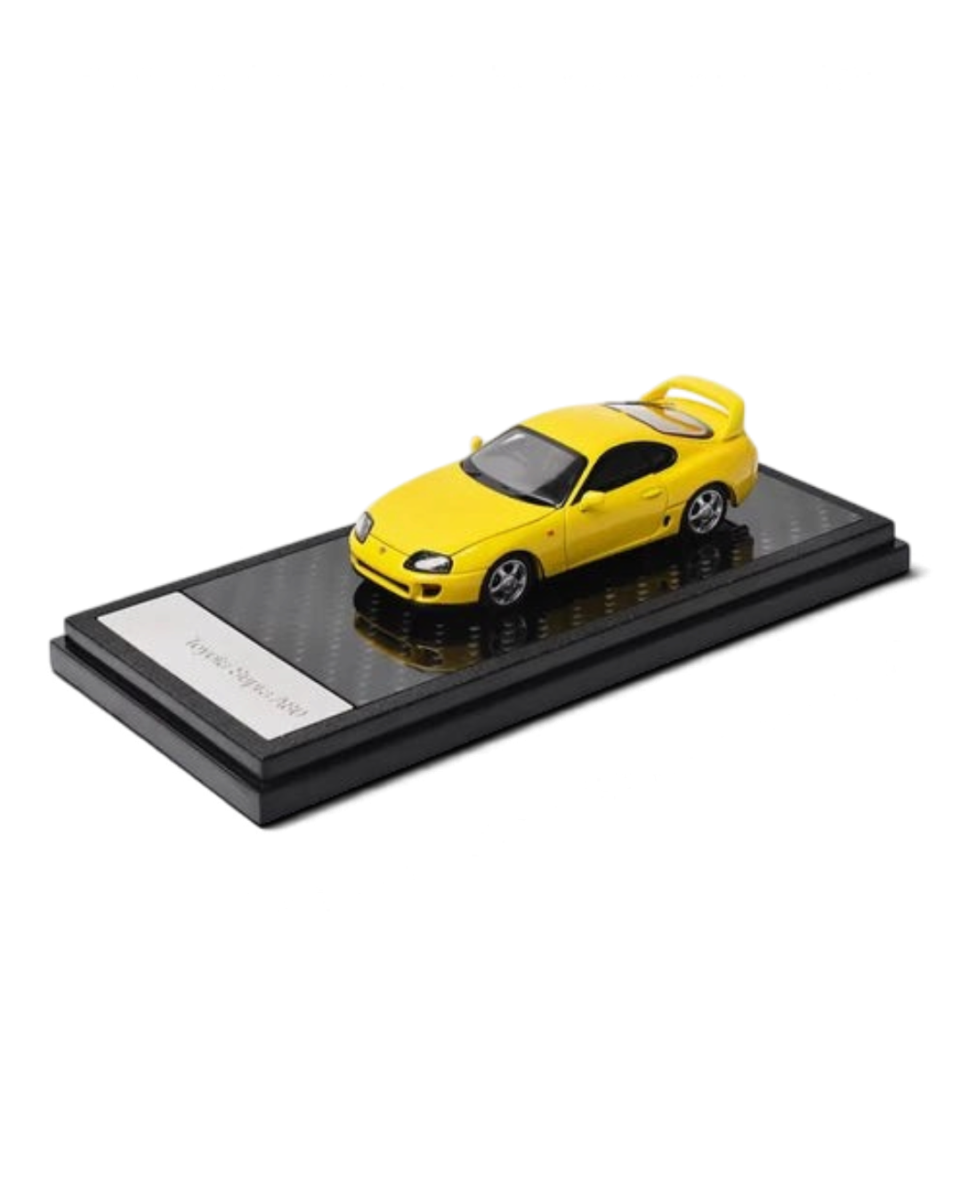 VaultifyUK 1:64 scale yellow Toyota Supra A80 diecast model car on a black display base with a nameplate.