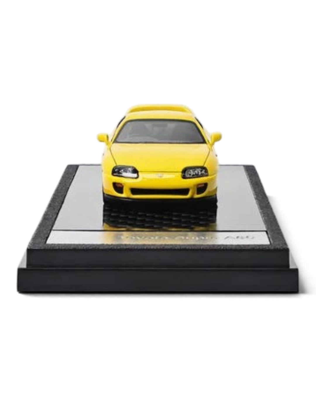 VaultifyUK yellow 1:64 scale LCD Models Toyota Supra A80 diecast car on a black display base, front view.