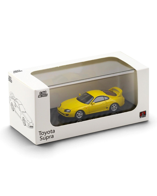 VaultifyUK 1:64 scale yellow Toyota Supra A80 model car in an acrylic display box