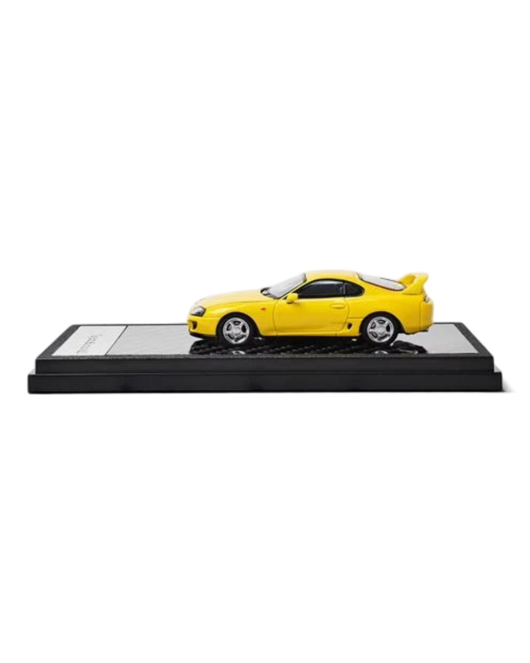 VaultifyUK 1:64 scale yellow Toyota Supra A80 diecast model car on a black display base