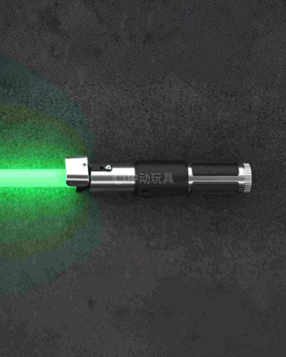 VaultifyUK ZD Toys Yoda lightsaber prop with a glowing green blade, silver hilt, and black grip detailing.